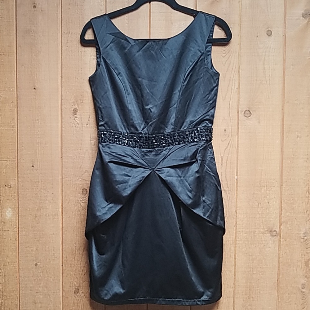 Black mini pump dress.